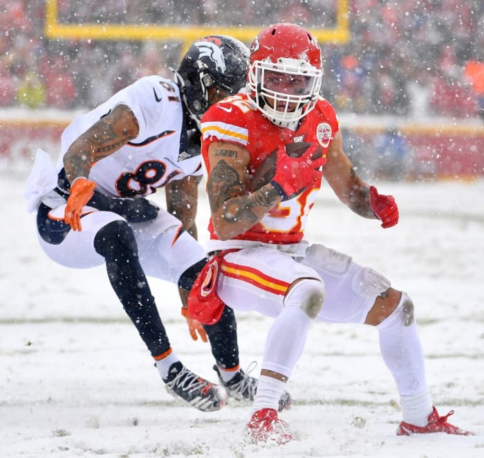 Kansas City safety Tyrann Mathieu (32) intercepts a pass intended for Broncos receiver Tim Patrick (81). Mandatory Credit: Denny Medley-USA TODAY Sports